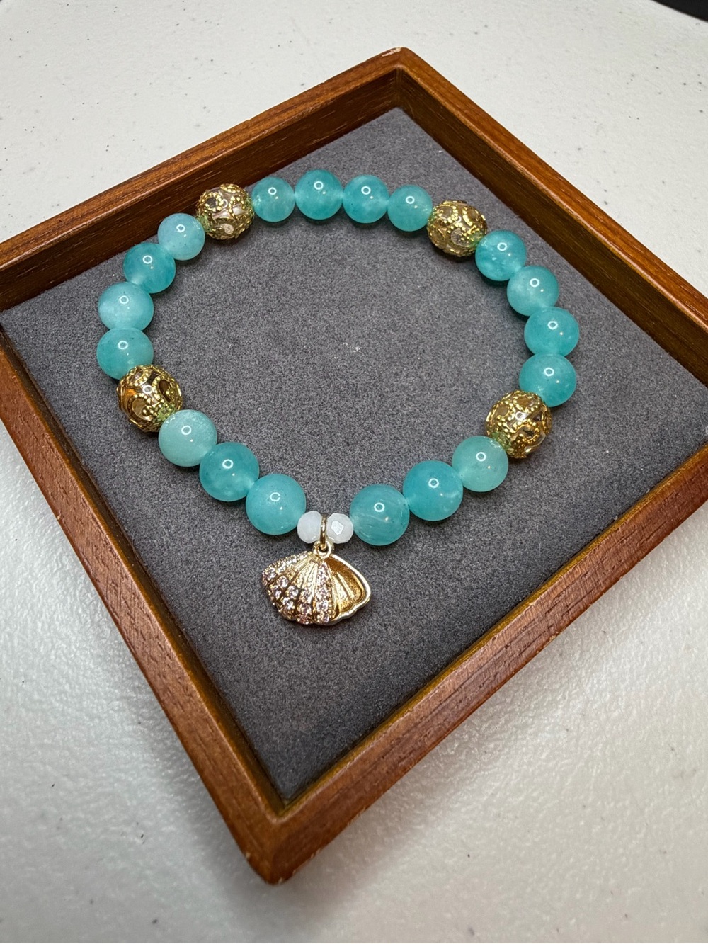 Aqua Beaded Shell Charm Stretch Bracelet with Gold Accents